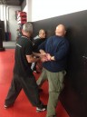 Law enforcement officers learn real life self-defense tactics with sapir tal
